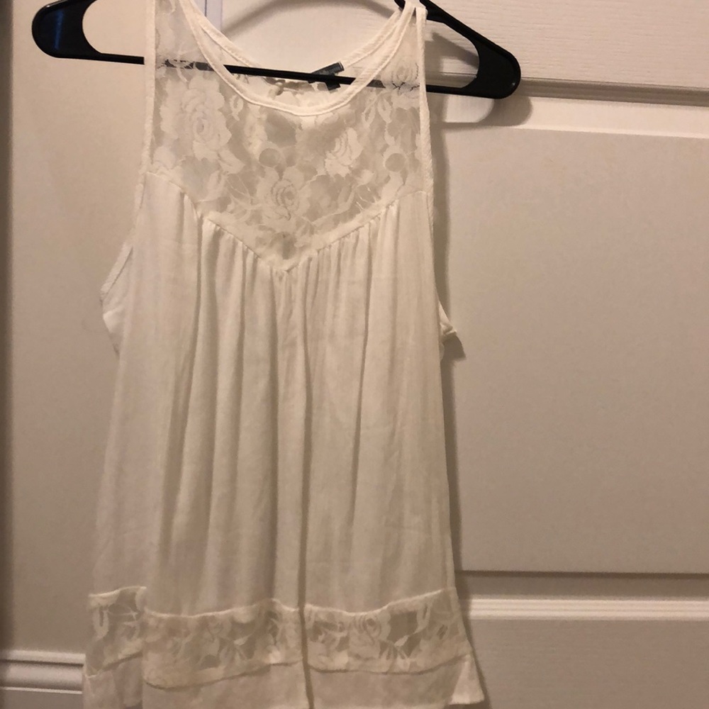 Like new never worn open back white tank blouse